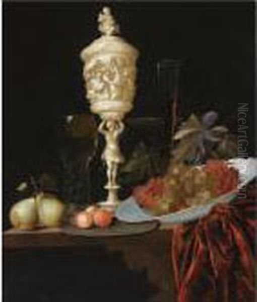 A Still Life With An Ivory 
Carved Cup And Cover, A Roemer, Pears, Prunes On A Pewter Plate, Grapes 
In A Porcelain Wan-li Bowl, A Flute-glass And A Tazza, All On A Wooden 
Ledge Draped With A Red Velvet Cloth Oil Painting by Johann Georg (also Hintz, Hainz, Heintz) Hinz