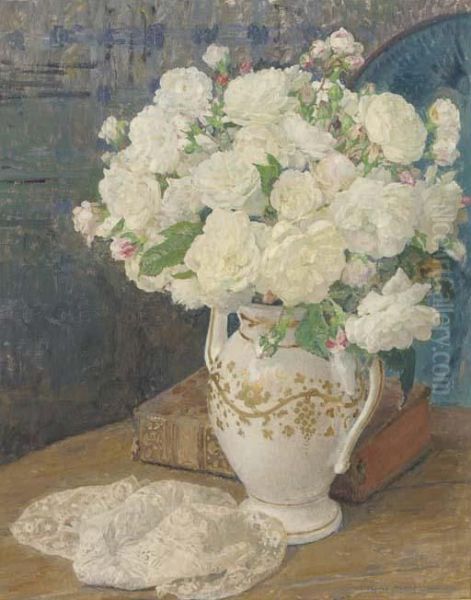 White Roses In A Vase, A Lace Handkerchief And A Book On A Table Inan Interior Oil Painting by Edgard Maxence
