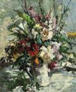 Calla Lilies, Poppies, 
Foxgloves, Cornflowers, Ferns And Otherblooms In A White Vase On A Table