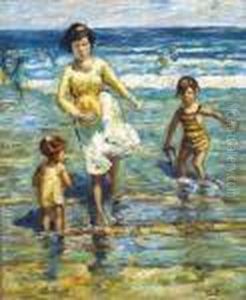 Mother With Her Children Wading In Water On A Beach