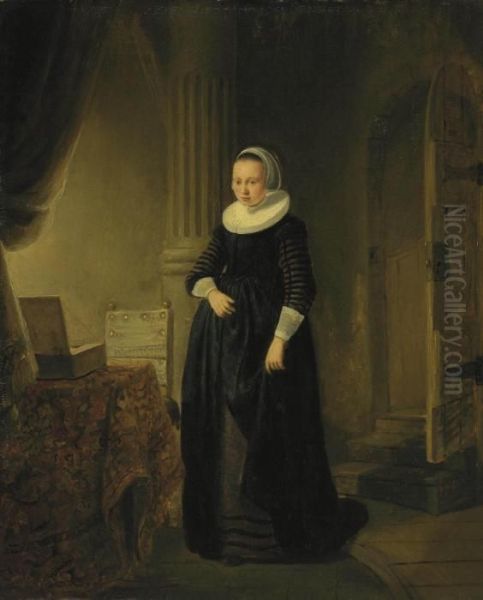 A Young Woman In An Interior Oil Painting by Rembrandt Van Rijn