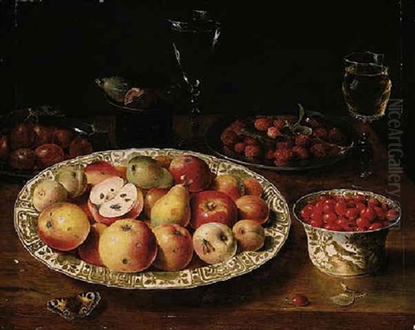 A Still Life Of Apples, Peaches And Pears In A Wan-li Porcelain Dish, Red Grapes, Plums, Raspberries, Figs, Glasses And A Butterfly On A Wooden Table Top Oil Painting by Osias Beert the Elder