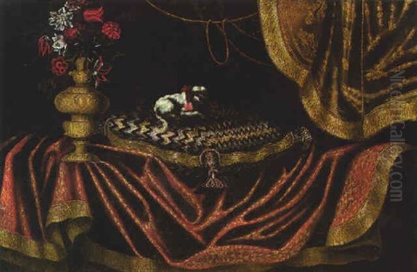 A Toy Spaniel On An Emboirdered Cushion With A Vase Of Flowers On A Draped Table Oil Painting by Antonio Gianlisi
