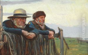 Two fishermen wathcing the sea on Skagen beach.