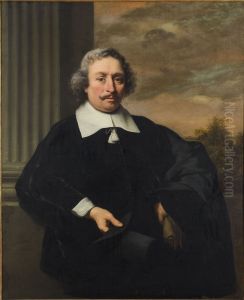 Portrait of a man holding a hat