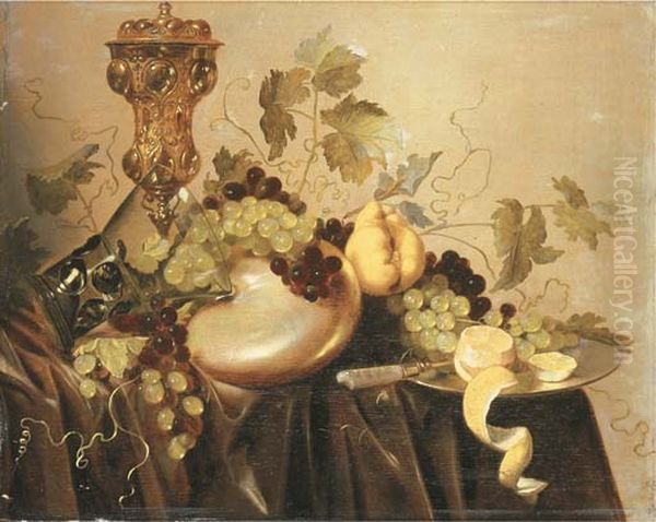 Still life with Akelei covered beaker, an upturned berkeyer resting on a nautilus shell, grapes, lemon and a knife Oil Painting by Pieter Nason