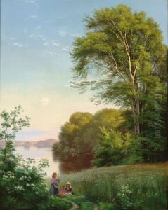 Three girls making wreaths near a lake.