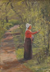 A woman picking a branch.