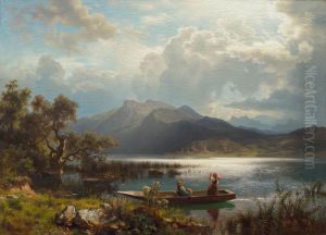 Shimmering mountain lake with girls in a boat
