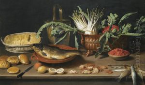 Still life with a fish on a terracotta plate, bunches of asparagus, artichokes and cherries in a scalloped dish, together with half a cheese in a basket, bread rolls, fraises de bois, lemons, oranges and crabs all arranged on a table top