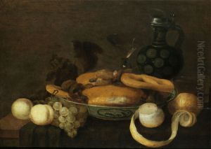 Kitchen still life with pastries, fruits, carafe and glasses