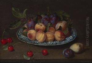 Platter of plums, peaches and pears with cherries on a table