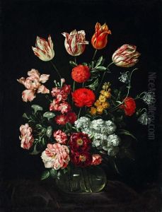Floral still life in a glass vase.
