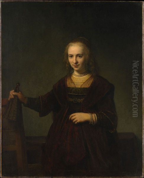 A Young Woman holding a Fan and the Back of a Chair Oil Painting by Rembrandt