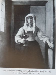 A Woman Holding a Wineglass in a Doorway