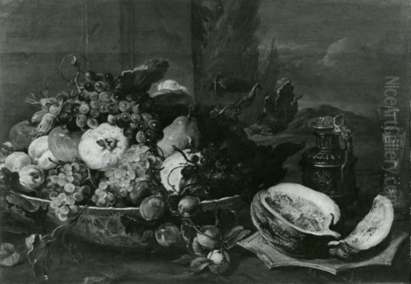 A fruit still life with a Wanli bowl with fruit and a wine glass on a table, a landscape beyond Oil Painting by Frans Snyders