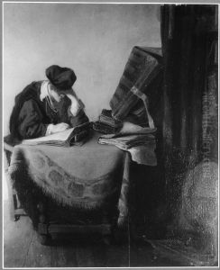 Young scholar reading in a study