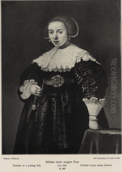 A Young Lady holding a Watch and a Chain in her Right Hand Oil Painting by Rembrandt