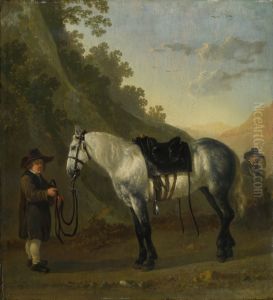 A Boy holding a Grey Horse