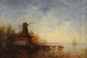 Windmill on riverbank