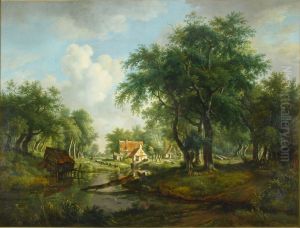Een boomrijk landschap met een beek