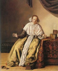 A young woman seated by a table