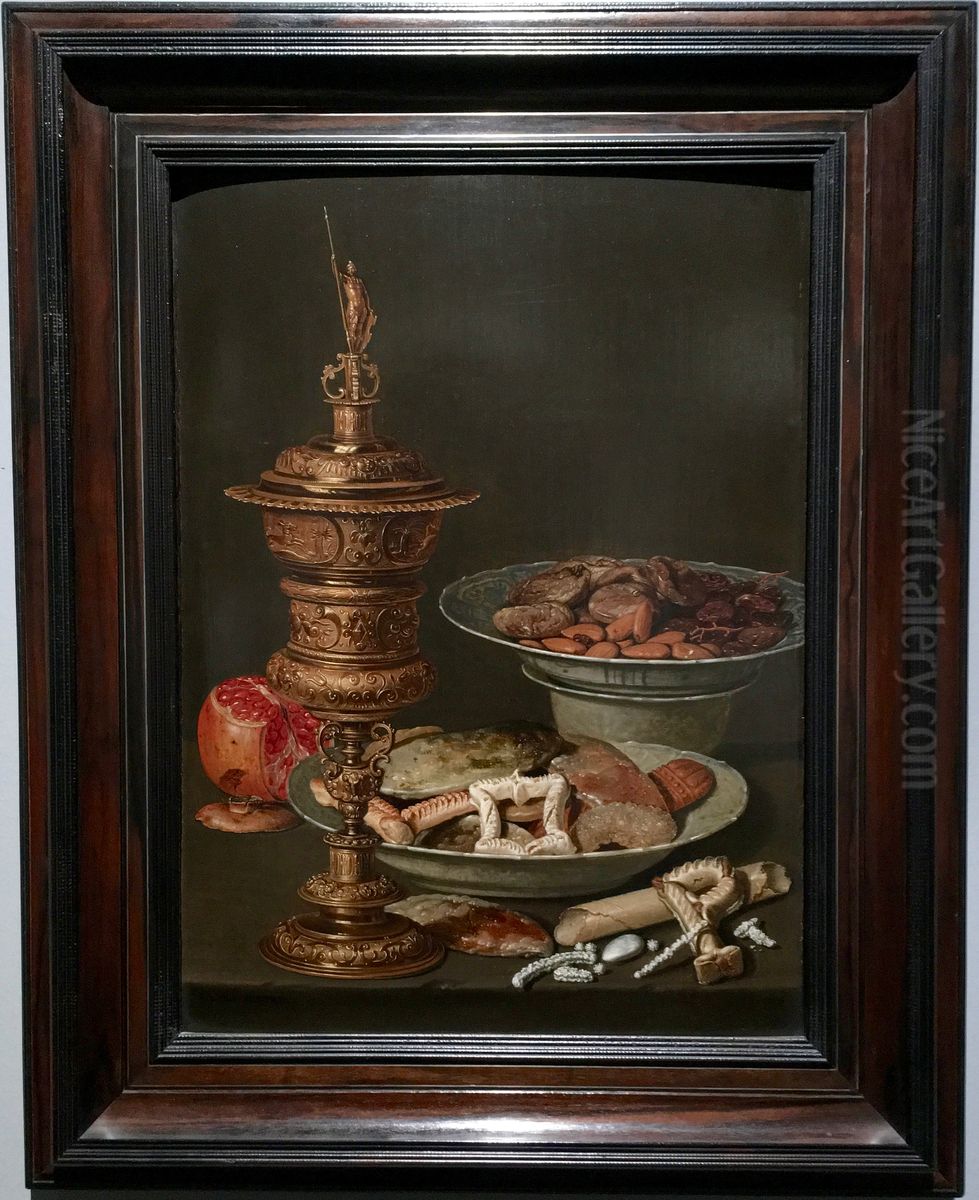 Still life with a gilt goblet, a pomegranate and Wan Li dishes with fruit, nuts and sweets Oil Painting by Clara Peeters