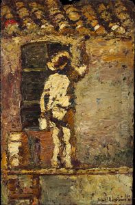 A painter at work on a house wall