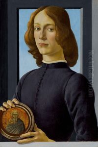 Portrait of a Young Man Holding a Medallion