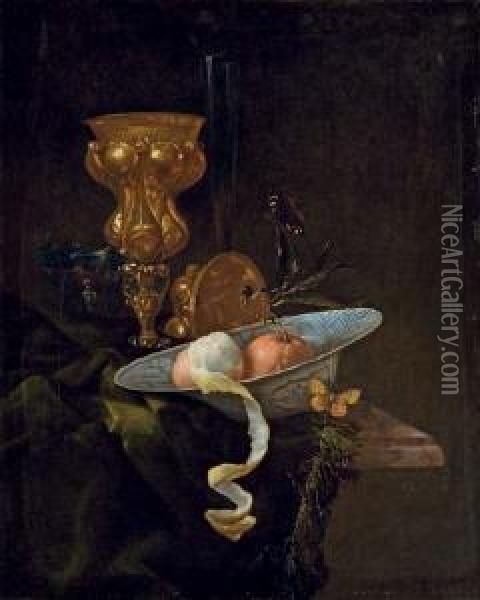 A Chalice, A Porcelain Bowl With Two Oranges And A Half-peeled Lemon, On A Draped Ledge With Two Butterflies Oil Painting - Christiaan Jansz. Striep