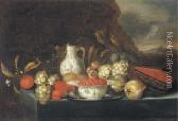 Grapes, Plums, Figs, Pears, 
Peaches, Oranges, A Melon, A Kraakporcelain Bowl Of Strawberries On A 
Pewter Platter With A Jug And Aglass Of Wine On A Stone Ledge In A 
Landscape Oil Painting - Jan Pauwel Gillemans The Elder