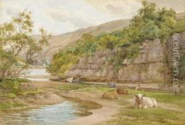 Cattle Resting On The Banks Of A River With A Fisherman Beyond Oil Painting - Charles James Adams