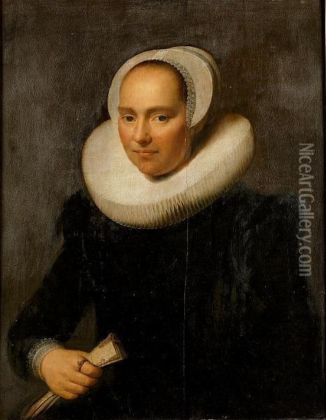 Portrait Of A Lady, Half-length,
 In A Black Dress With A Ruff And A Lace Cap, Holding A Glove Oil Painting - Michiel Jansz. Van Miereveldt