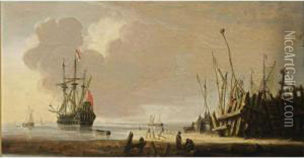 A Man-of-war In Calm Waters 
Together With Other Vessels, Other Sailing Boats Moored At A Quay In The
 Foreground Oil Painting - Hendrick Dubbels