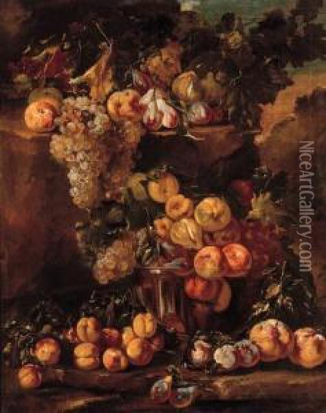 Grapes, Apples, Plums And Figs In A Glass Bowl With Other Fruit Ona Ledge In A Landscape Oil Painting - Michele Pace Del (Michelangelo di) Campidoglio