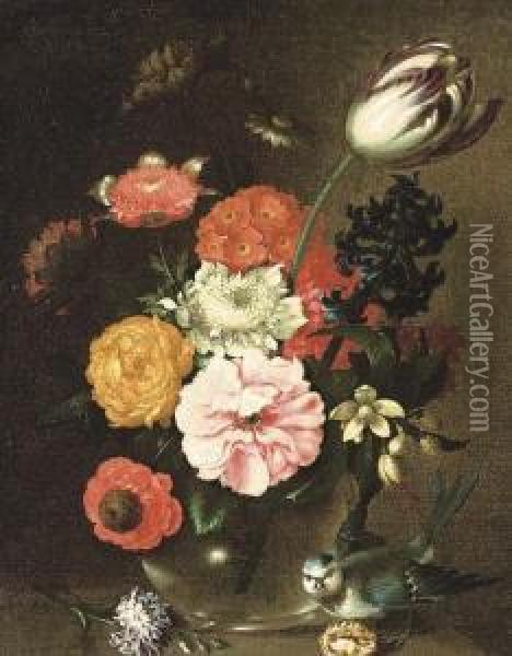 Parrot Tulips, Roses, Narcissae, Carnations And Other Flowers In A Glass Vase On A Ledge With A Swallow; And Roses, A Parrot Tulip, Primula, Bluebells And Other Flowers In A Glass Vase, On A Ledge With A Swallow And A Walnut Oil Painting - August Wilhelm Sievert