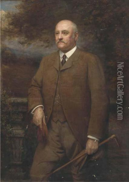 Portrait Of A Gentleman, 
Standing Three-quarter-length, In A Browntweed Suit, Holding A Crop, Cap
 And Gloves, A Landscapebeyond Oil Painting - Arthur Trevor Haddon