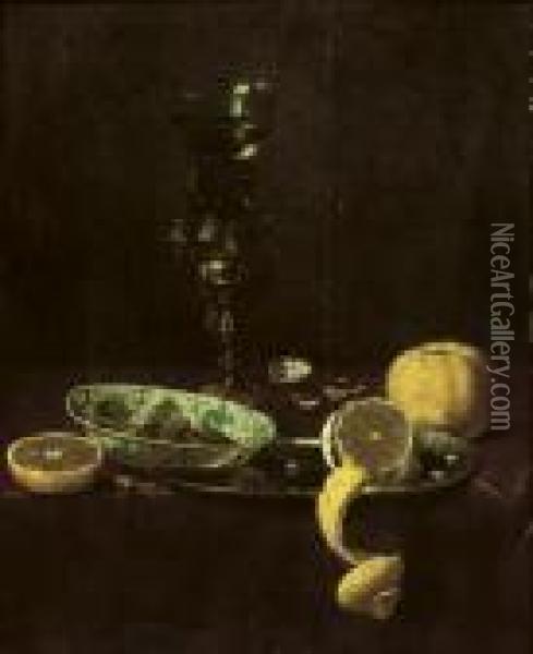 A 'kraak' Porcelain Bowl Resting On A Pewter Plate With A Peeled Lemon, An Orange And Nuts Near A 'roemer' On A Gilt Stand Oil Painting - Jan III van de Velde