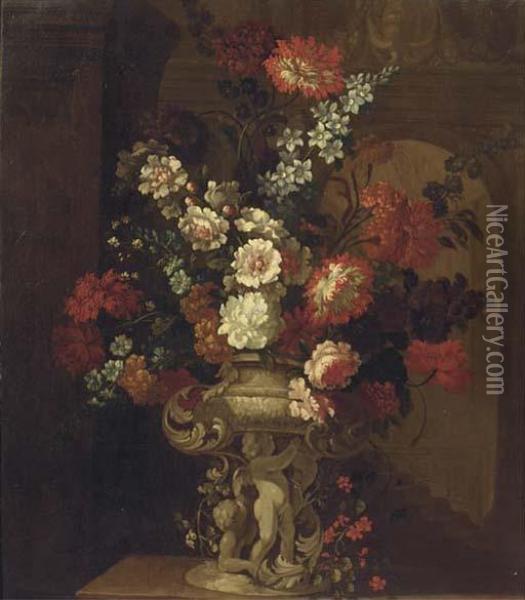Mixed Flowers In A Sculpted Urn With Putti On A Ledge, In Aninterior Oil Painting - Pieter III Casteels