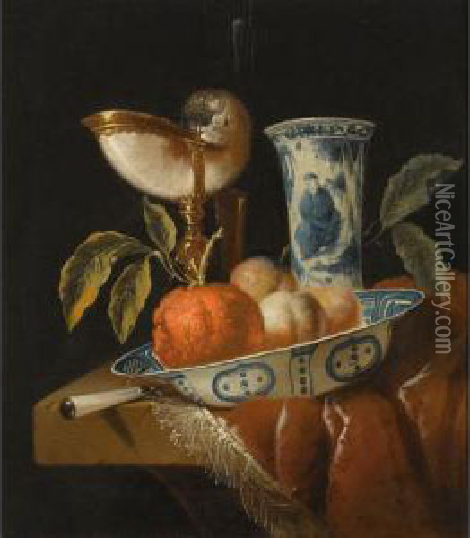 A Still Life With An Orange And 
Peaches In A Porcelain Wan-li Bowl, A Nautilus Cup, A Chinese Porcelain 
Vase And A Knife, All On A Stone Table Draped With A Red Velvet Cloth Oil Painting - Jacob Cornelisz. Van Oostsanen