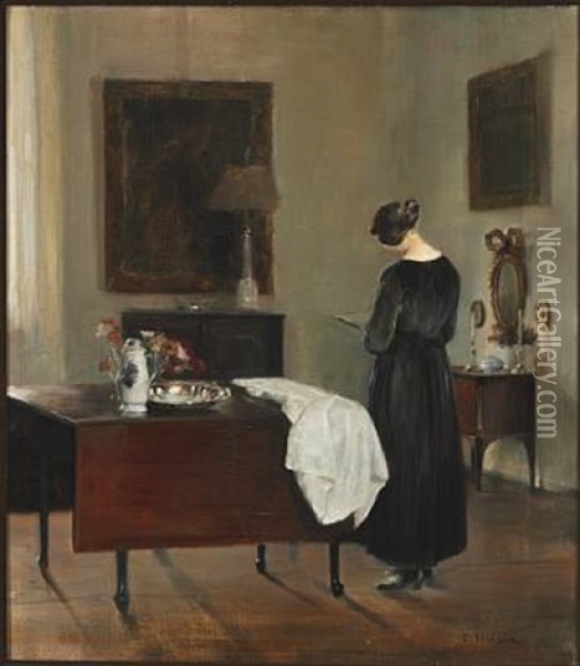 The Painter's Wife Reading In A Corner In The Living Room Oil Painting - Carl Vilhelm Holsoe