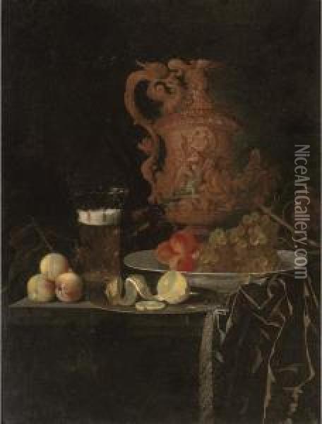 A Gilt Ewer, A Roemer Of Beer, 
Peaches, A Partly-peeled Lemon On Apewter Tray, And Grapes And Peaches 
In A Porcelain Dish On Apartly-draped Table Oil Painting - Johann Georg (also Hintz, Hainz, Heintz) Hinz