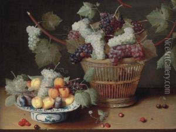 Grapes, Peaches And Plums On A Delft Platter And Grapes In A Woven Basket Oil Painting - Isaak Soreau