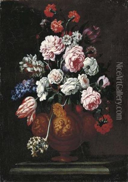 Roses, Carnations, Tulips And Other Flowers In A Sculpted Urn On A Stone Ledge Oil Painting - Giovanni Stanchi