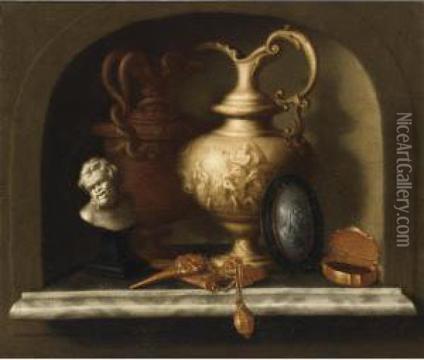 A Still Life With Two Sculpted 
Jugs With A Scene With Neptune, An Intaglio Medallion, A Golden 
Snuff-box, A Golden Chatelaine And A Small Bust Of A Satyr, All In A 
Stone Niche Oil Painting - Pieter Gerritsz. van Roestraten