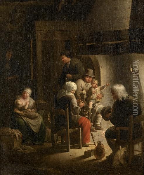 A Kitchen Interior With A Peasant Family Around A Fireplace Oil Painting - Herman Wouter Beekkerk