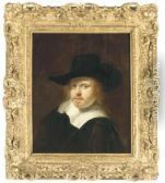 Portrait Of A Man, Bust-length, In A Black Hat Oil Painting - Ferdinand Bol