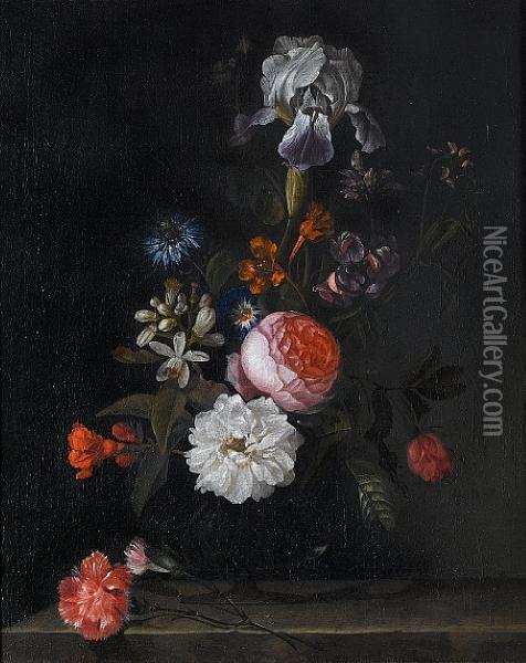 Roses, An Iris, Carnations And Other Flowersin A Glass Vase On A Stone Ledge Oil Painting - Cornelis Kick