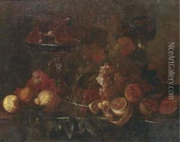 Grapes, Lemons, Pomegranates, An
 Orange And Other Fruit On Pewter Platters, With A Tazza Of Figs On A 
Table Oil Painting - Cornelis De Heem