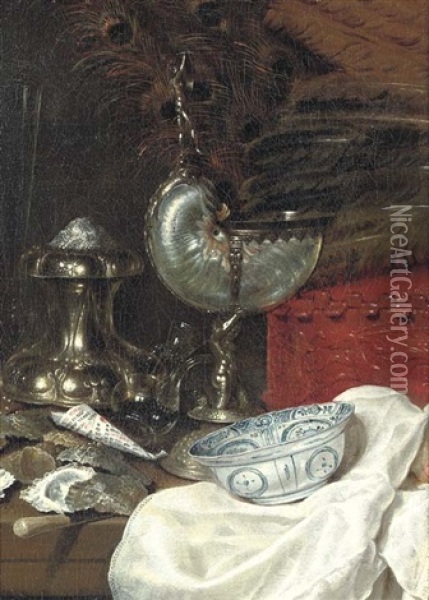 A Nautilus Cup With A Silver Salt, A Red Clay Pot Decorated With A Prancing Stag Holding Ostrich Feathers On A Partially Draped Table... Oil Painting - Willem Claesz Heda